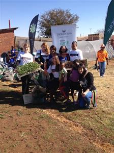 Miss Earth brings the gift of giving to Lulama Primary for Mandela day 