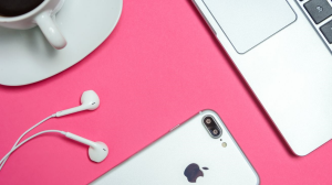 blog-image-five-things-your-brand-should-be-doing-during-lockdown smart phone with pink background