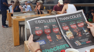 Checkers advertises in London and Sydney newspapers