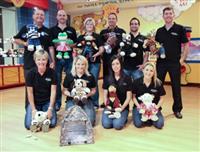 Gold coin exchange members climb Kilimanjaro for Madiba and teddies