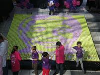 Purple Plumm construct cupcake mural of Nelson Mandela